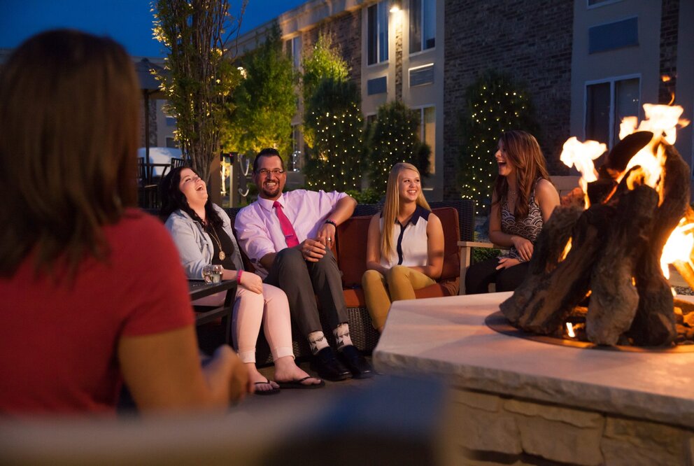 Group Around Firepit at Marshfield Hotel